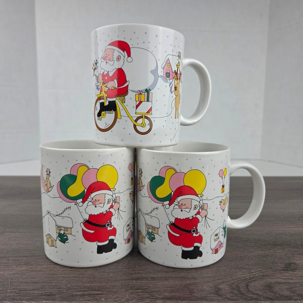 Whimsical Santa Claus Christmas Mugs Santa Riding Bicycle Balloons Vintage MCM